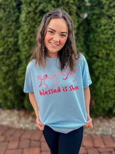 BLESSED IS SHE TEE >Comfort Colors Brand >Unisex Fit *Model wearing size M Light Blue Crew Neck Top With Text Print, Casual Light Blue Pre-shrunk T-shirt, Light Blue Crew Neck T-shirt With Screen Print, Bless Your Heart Shirt, Light Blue Text Print Crew Neck T-shirt, Light Blue Crew Neck T-shirt With Text Print, Light Blue Relaxed Fit T-shirt With Text Print, Light Blue Short Sleeve T-shirt With Text Print, Relaxed Fit Light Blue T-shirt With Text Print