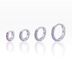 Purple Opal eternity Huggie ring -  huggie hoop - Rook - cartilage - helix - lobe earring Listing : single - Material : Sterling silver casting - AAA Purple opal gems - 18 gauge, 5,6,8,10mm diameter available suitable for Rook/helix/cartilage/lobe/tragus piercing Huggie stye :  A hinge is located at the top of the earring that allows the post to open and close without an earring back. Or if you have any question please feel free to send me convo before place an order =) Unique piece and easy to Silver Huggie Septum Ring, Silver Halo Huggie Earrings, Silver Stackable Huggie Earrings, Huge Rings, Silver Casting, Purple Opal, Dagger Earrings, Country Jewelry, Tragus Piercing