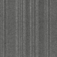 an up close shot of a gray striped wallpaper