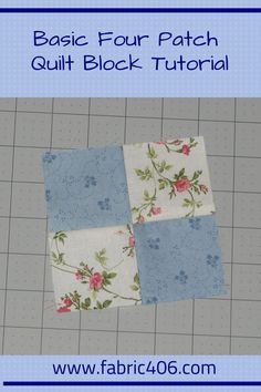 the four patch quilt block is made with blue and white fabric, which has pink flowers on it