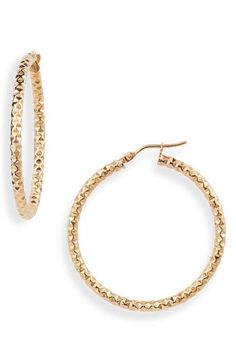 A faceted design allows light to reflect from every angle of these large, textured hoops handcrafted in 14-karat gold. 1 1/2" drop; 1/8" width Snap-post closure Handcrafted 14k gold Made in Italy Small Hammered Hoop Earrings For Formal Occasions, Elegant Textured Jewelry For Anniversary, Formal Hammered 14k Gold Hoop Earrings, Formal 14k Gold Hammered Hoop Earrings, Textured 14k Yellow Gold Jewelry, Elegant Gold Faceted Hoop Earrings, Textured Small Hoop Jewelry For Gifts, Textured Gold Jewelry For Anniversary, Textured Small Hoop Jewelry Gift