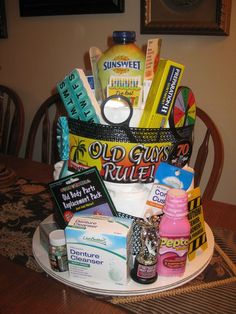 a table topped with a bucket filled with lots of different types of items on top of it