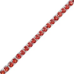 Wrap your wrist in playful style with this fun red garnet paper clip chain bracelet in silver. Crafted in sterling silver This design simply glistens with a row of petite regal red garnets. Garnet is the traditional birthstone for January and symbolizes friendship, loyalty and devotion. This 7.0-inch paper clip chain bracelet secures with a lobster claw clasp. Red Gemstone Tennis Bracelet In Fine Jewelry Style, Red Gemstone Tennis Bracelet Fine Jewelry, Red Gemstone Tennis Bracelet, Red Fine Jewelry Tennis Bracelet As Gift, Red Tennis Bracelet Gift, Silver Ruby Tennis Bracelet Gift, Bracelet In Silver, Playful Style, Red Garnet