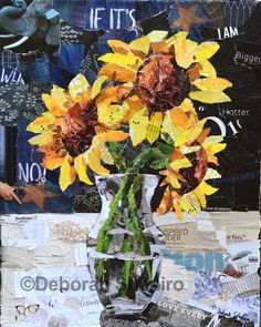 a vase filled with yellow flowers sitting on top of a table next to a wall