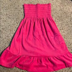 Super Cute And Never Worn Casual Strapless Lined Sundress, Casual Pink Strapless Sundress, Casual Pink Strapless Mini Dress, Chic Pink Skirted Dress, Spring Holiday Knee-length Mini Dress, Knee-length Mini Dress For Spring Holiday, Pink Strapless Cotton Mini Dress, Casual Strapless Lined Mini Dress, Strapless Pink Cotton Dress