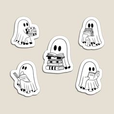 four ghost stickers with books in their hands