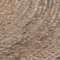 a close up view of a rug with different colors and patterns on the carpeting