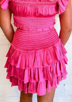 Twirl into feminine charm with this pink 3-tiered skirt, a delightful and playful ensemble that effortlessly combines flounce and style for a whimsical and fashionable look. 100% Polyester Dry Clean Only Meet Hannah! Height: 5’6” Hips: 34” Bust: 33” Waist: 25” Wearing Size: Small Ruffle Skort, Seychelles, Tiered Skirt, Hot Pink, Dry Clean, Size Small, Skirt, Pink, How To Wear