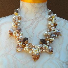 Be Dazzling in 2024!!!!!

Unique Pearl Cluster Bridal Statement Necklace - Bronze & Gold Murano Glass Pendant Collar - Twisted Wire Gift for Her


@TheFinerArtsGallery
@HiddenintheHills
https://blingbeadedbar.etsy.com Bridal Statement Necklace, Twisted Sister, Sister Necklace, Topaz Engagement Ring, Wire Necklace, Rose Quartz Beads, Pearl Cluster, Twisted Wire, Bronze Gold