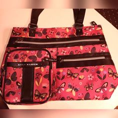 Lily Bloom Della Tote Bag. Butterfly Meadow Print. Measurements Shown In Photos. Two Straps With Each Measuring Approximately 24 Inches. Three Zipper Pockets On The Outside With One Large Slip Pocket On The Outside. Inside Has One Zipper Pocket. New Without Tags. Pink Travel Bag With Cell Phone Pocket, Pink Satchel Bag With Cell Phone Pocket, Pink Satchel With Cell Phone Pocket, Pink School Bags With Cell Phone Pocket, Pink Bag With Cell Phone Pocket For Everyday Use, Everyday Pink Bag With Cell Phone Pocket, Pink Tote Bag With Cell Phone Pocket, Pink Shoulder Bag With Cell Phone Pocket For Everyday, Pink Shoulder Bag With Zipper For Everyday Use