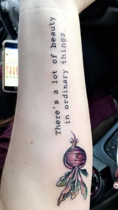 a person with a tattoo on their arm that says, there is plenty to eat