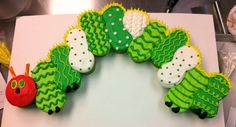 a very cute looking cake made to look like a caterpillar