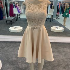 Elegant Laced Sweetheart Skater Skirt Gown. Cream A-line Prom Dress, Elegant Champagne Dress For Homecoming, Elegant Champagne Homecoming Dress, Beige Sweetheart Neckline Dress For Prom Season, Beige Sweetheart Neckline Dress For Prom, Beige Sweetheart Neckline Bridesmaid Dress, Beige Bridesmaid Dress With Sweetheart Neckline, Elegant Homecoming Dress With Lace Back, Homecoming Dresses With Lace Back