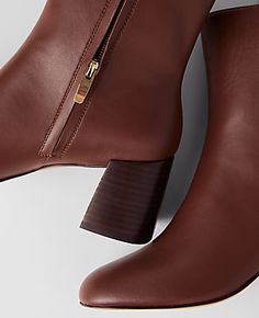 Crafted in luxe leather, our unstoppable flare heel booties flatter - every step of the way. Pointy toe. Inside zip. Padded footbed for complete comfort. 2 1/2" heel.,Fabrication:Leather Flare Heel Leather Bootie by Ann Taylor Size regular - 9 Pebble Brown Women's High, Booties, Footwear, Leather Leather Booties, Bootie, Ann Taylor, The Way, Heels, Leather, Fabric