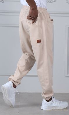 QL Relaxed Cotton STRETCH Cuffed Trousers in Beige Description:QL Relaxed Cotton Stretch Cuffed Trousers offer a perfect balance of laid back, chic and sporty styles! Straight cut harem pants with ultra soft and very elastic stretch cotton fabric. Very comfortable and flexible, it allows you to be free to move while being stylish! Modern Islamic clothing for men High-quality fabric from top brands Logo on the back pocket and ribbed cuffs Two side patch pockets and two back patch pockets Elastic Laid Back Chic, Modern Islamic Clothing, Top Brands Logo, Beige Clothing, Crazy Pants, Cuffed Trousers, Sporty Wear, Brands Logo, Stylish Makeup