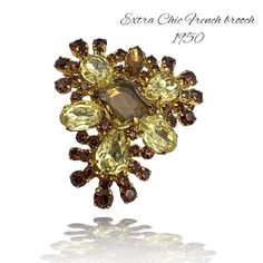 "There is so much beauty in this 1950s French brooch, sumptuous and bright! Let's start by talking about the marvelous shade, it is created using a super chic palette of colors: the Jonquil mixed  with light amber and topaz, among which the deep amber insinuates itself Then, with the structure of the design: the drop,marquise and round stones were cleverly set on triangle shaped base in gold finish, on two levels that are enhanced by the beauty of the unfoiled cushion stone placed at the center Elegant Yellow Brooches For Party, Elegant Yellow Party Brooch, Elegant Yellow Party Brooches, Retro Gold Brooch For Evening, Retro Gold Brooches For Evening, Gold Retro Brooches For Evening, Yellow Vintage Brooch For Party, Italian High Fashion, Unique Brooch