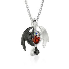 Can you believe it? This dragon couple's relationship is one of the strongest romance relationship in the fictional world. Crafted in sterling silver, this necklace in Hug Me® collection shows a loving dragon couple hugged a heart-cut stone together. As a great Valentine and Christmas gift, the meaningful necklace celebrates your everlasting love. You will find more adorable and creative designs in our Hug Me® collection.Carat Weight: 0.5 ctStone Size: 5*5 mmStone Type: Jeulia® StoneNumber of St Fantasy Sterling Silver Necklace For Gift, Elegant Dragon Design Necklace As A Gift, Elegant Dragon Design Necklace As Gift, Sterling Silver Fantasy Necklace For Gift, Adjustable Dragon Design Necklace As A Gift, Silver Dragon Design Jewelry For Anniversary, Elegant Dragon Design Necklace Gift, Gothic Sterling Silver Necklace For Valentine's Day, Dragon Couple