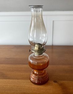 Vintage  P & A Risdon Mfg. Co. oil/kerosene table top lamp. Eagle burner with working wick knob - No Wick included Amber depression glass pedestal style lamp  Clear glass chimney with a beaded rim with wick. Good vintage condition - used item, no cracks, chips or repairs  Please examine all photos as they are part of the item description If you have any questions, please contact me before purchasing. All Vintage items are in used condition and are sold as is. For International Purchases (all ord Table Top Lamps, Glass Pedestal, Lamp Vintage, Collections Etc, Kerosene, Oil Lamp, Top Light, Light Lamp, Oil Lamps