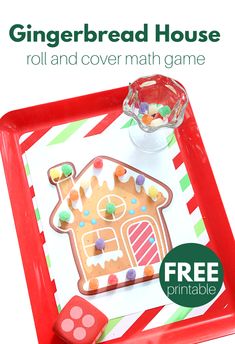 a gingerbread house roll and cover math game with free printables for kids