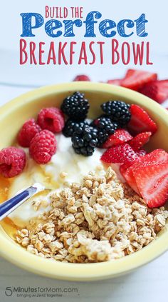 a bowl filled with granola, berries and yogurt