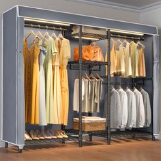 an organized closet with clothes and shoes