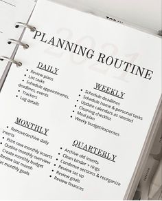 a planner with the words planning routine written in black and white on top of it