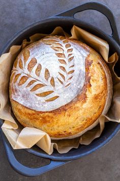 a loaf of bread in a cast iron skillet