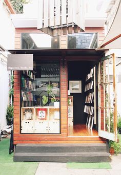 an open book store on the side of a building