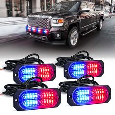 four lights are shown on the front of a truck and one is red, blue, and white