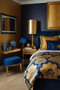 a bedroom with blue and gold decor on the bed, nightstands, and chair