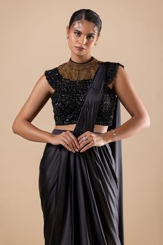 Black pre-draped saree. Paired with a padded blouse with crystal, cutdana, sequins and Swarovski embroidery. - Aza Fashions Glamorous Party Pre-draped Saree With Cape Sleeves, Unstitched Blouse Piece With Cape Sleeves For Party, Festive Party Wear Blouse With Draped Sleeves, Party Saree With Zari Work And Cape Sleeves, Unstitched Blouse With Cape Sleeves For Evening, Evening Unstitched Blouse With Cape Sleeves, Unstitched Evening Blouse With Cape Sleeves, Party Georgette Blouse With Cape Sleeves, Bollywood Style Pre-draped Saree With Cape Sleeves For Party