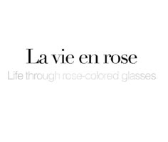 the words la vie en rose are in black and white