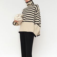 The changing black and white stripes are rich in layering. Wide cuffs and high collar design, warm and fashionable. There are two materials to choose from. Gender: Woman Season: Autumn / Winter Style: simple and casual Type: loose hedging Collar type: high collar Thickness: Thicker Sleeve length: long sleeves Sleeve type: flared sleeves Length: Normal Fabric name: Knitted Fabric composition: Wool Blend Pattern: Stripe Size Length Bust Shoulder Sleeve S 60cm 128cm 51cm 52cm M 62cm 132cm 53cm 53cm L 64cm 136cm 55cm 54cm Crochet Clothing, Loose Pullover, Black And White Stripes, Wide Cuff, Collar Designs, Season Autumn, White Sweaters, Winter Style, Black Wool