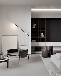 a modern living room with black and white furniture