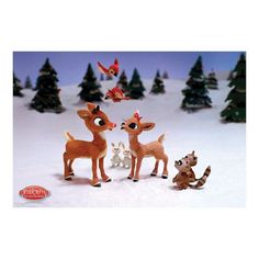 rudolph and friends in the snow with christmas trees