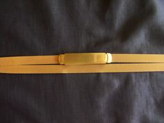 Vintage skinny mesh gold belt in excellent condition with no obvious wear. Very sleek looking and not too heavy to wear. This measures about 30 inches when buckled, and there is no adjustment or stretch on this belt. More fun vintage accessories in my shop: https://www.etsy.com/shop/badkittyvintagefinds?ref=hdr_shop_menu§ion_id=14399075 Adjustable Gold Belt For Formal Wear, Adjustable Gold Belt For Formal Occasions, Adjustable Gold Belt For Evening, 15th Wedding Anniversary, British Hong Kong, Gold Belt, Gold Belts, Vintage Bunny, Vintage Gothic