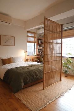 Tips and ideas for how to get the perfect loft bedroom including tips on storage, lighting and room dividers.