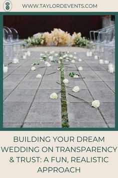 a wedding ceremony with flowers and candles on the ground