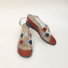 "DETAILS * the perfect mod wedge sandal * vinyl front with sewn on suede patches * peep toe * adjustable sling back * classic 60s mid century colors ERA: 1960s LABEL: Amano, Carefree Last SIZE: Marked an 8 but fit like a 7.5 Narrow width of ball foot: 3\" insole: approx 9.75\" heel: 2.5\" MATERIAL: vinyl, suede COLOR: clear, rust, beige, gray CONDITION: Excellent vintage condition. DISCLAIMER: Be aware that vintage shoes come in As Is condition. These shoes have been checked and tested to see if Retro Open Toe Wedge Sandals For Beach, Retro Wedge Sandals For Beach, Retro High Heel Wedge Sandals, Vintage Open Toe Wedge Sandals For Beach, Retro Wedge Heel Beach Sandals, Vintage Wedge Sandals For Beach, Retro Wedge Heel Sandals For Summer, Retro Wedge Sandals For The Beach, Retro Wedge Heel Sandals For Beach