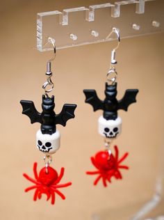 All the scary things come out on Halloween night!  These handmade earrings are created from authentic LEGO® parts.  They are secured together so you won't have to worry about them separating while wearing.  You can choose either red or black spiders when adding to the cart. Approx 7" in hanging size length. Spooky Red Halloween Jewelry, Fun Red Halloween Jewelry, Red Fun Halloween Jewelry, Fun Red Jewelry For Halloween, Red Halloween Earrings, Lego Skull, Accessories Shifting, Lego Magazine, Lego Crafts