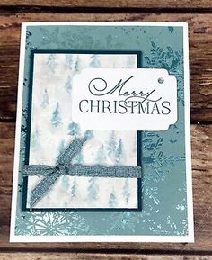 a christmas card with snowflakes on it and a tag that says merry christmas