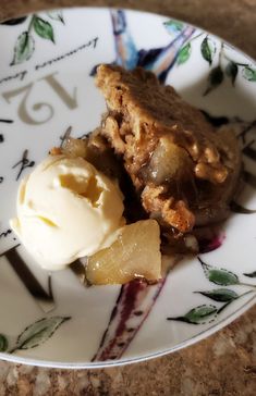 a piece of pie and ice cream on a plate