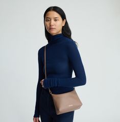 !!!Description---Our Hera Bag is lightweight and versatile, crafted from a delicate, supple lambskin leather that can be styled as a shoulder bag, crossbody, or clutch. !!!Fits---iPhone Max and smaller !!!Details---Width: 9.8in / 25cm Height: 5.5in / 14cm Depth: 1.2in 3cm – at the top 3.2in / 8cm – at the bottom Shoulder Strap: 11.5in / 29cm Crossbody Drop: 19in / 48cm Composition: 100% Italian Lambskin Leather Made in Italy !!!Materials---Our Italian lambskin is an ultra-smooth, buttery leather Lambskin Leather, Bago, New Bag, Pomegranate, Shoulder Strap, In Italy, Shoulder Bag, Leather