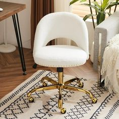 a white desk chair sitting on top of a rug