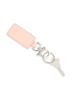 a key chain with a pink leather tag on it