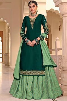 Enhance your ethnic charm by wearing this pistachio green jacquard lehenga will make you ready to make a statement in the upcoming occassion.This round neck and 3/4th sleeve long choli is designed with resham, stone, and zari work.Along with jacquard flared style lehenga in pistachio green color with pistachio green nazneen dupatta.Flared style lehenga has woven zari work.Dupatta is plain.This lehenga choli can be customized up to maximum size available in inches 58. Slight color variation may o Green Dupatta Combination Suit, Green Rangoli, Maroon Salwar, Green Dupatta, Silk Anarkali, Lehenga Suit, Churidar Suits, Lehenga Online, Lehenga Style