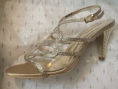 Vintage Gold Shoes with Rhinestones in good vintage condition.  Size 38. 3" heels Open Toe Heels With Rhinestones For Dinner, Open Toe Rhinestone Heels For Dinner, Retro Gold Heels For Party, Silver Vintage Heels For Party, Gold Lace-up Heels For Evening, Retro Gold Open Toe Heels, Vintage Gold Heels With 4-inch Heel, Rhinestone Sandals, Gold Shoes