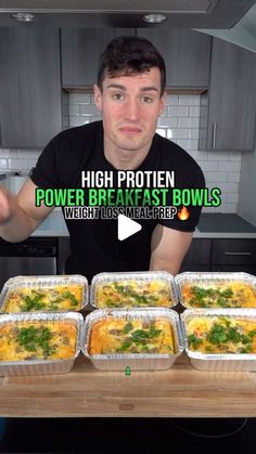 a man is holding up four trays of food in front of him and the words high protein power breakfast bowls