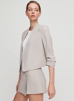 Babaton MACAULEY BLAZER SHORT | Aritzia Tailored Versatile Outerwear For Formal Occasions, Elegant Formal Open Front Outerwear, Versatile Spring Formal Blazer, Versatile Formal Spring Blazer, Versatile Formal Blazer For Spring, Elegant Open Front Blazer, Fitted Notch Lapel Versatile Blazer, Elegant Open Front Solid Color Blazer, Fitted Open Front Elegant Blazer