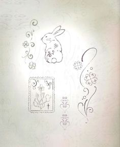 some drawings are on the wall and one has a rabbit in it's head